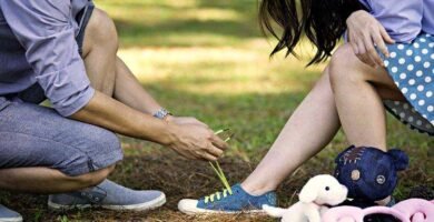 man folding shoeless